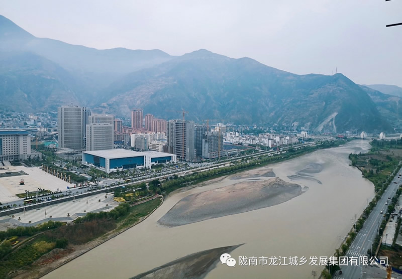 匠心傾注、喜封金頂——龍江?雙子座商住小區主體順利封頂